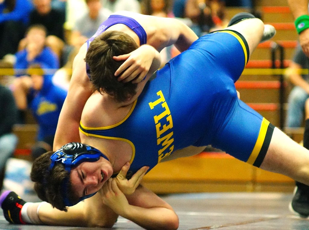 Sports: Local hoopers and wrestlers take to the courts