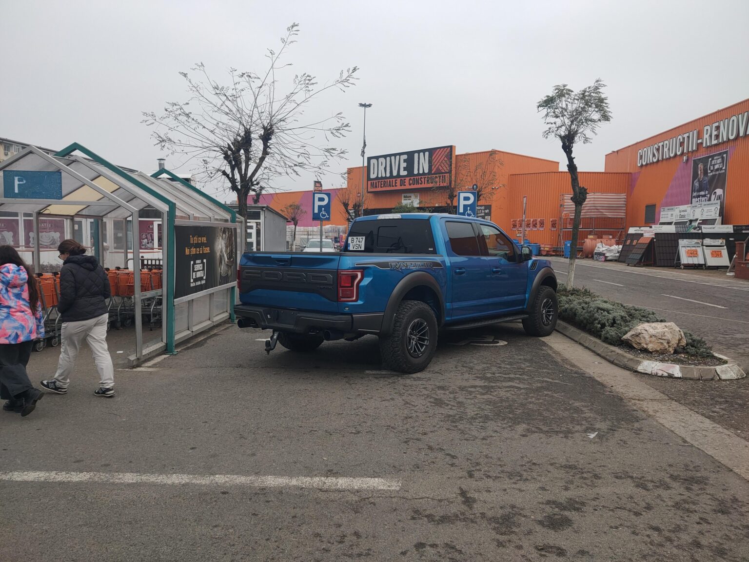 Two handicap parking spaces? Let's take them both, shall we?
