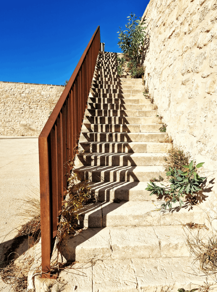 shadows on a stone stairway at Castillo de San Fernando, Alicante