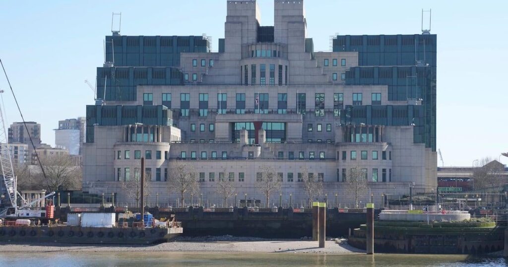 Britain’s MI6 spy chief says Putin is dragging out peace talks and wants to subjugate Ukraine