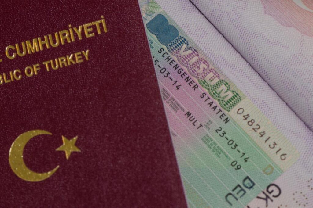 Montenegro restores visa-free travel for Turkish citizens, cuts stay to 30 days Turkish Passport and Schengen Visa, date and time undisclosed. (Adobe Stock Photo)