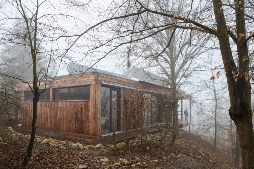 Larch-clad exterior of home extension by Päivä Architekti