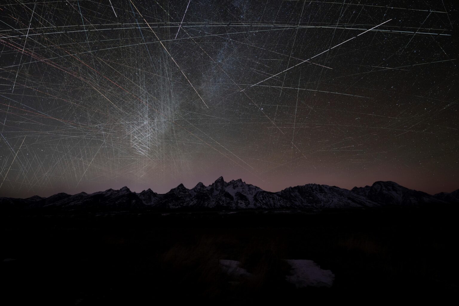 The number of satellites in our sky is getting pretty crazy. This is a compilation of 11 hours of exposures taken during the geminid meteor shower.