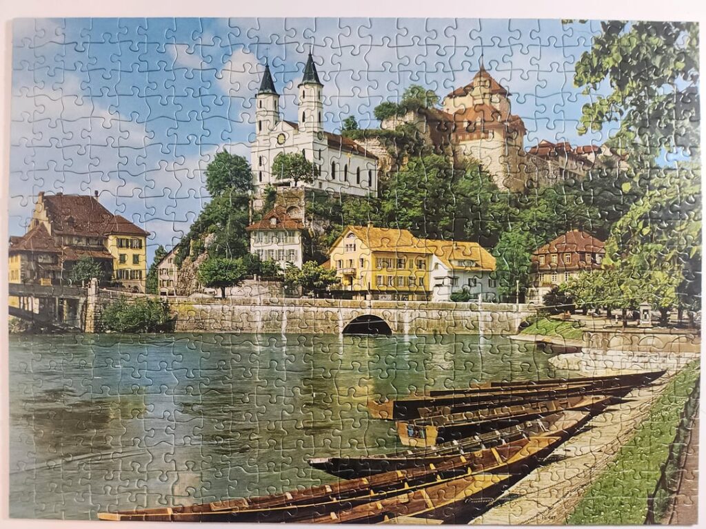 Gorgeous, vintage Ravensburger jigsaw puzzle from 1971 titled "Aarburg" that I thought would be appreciated here.