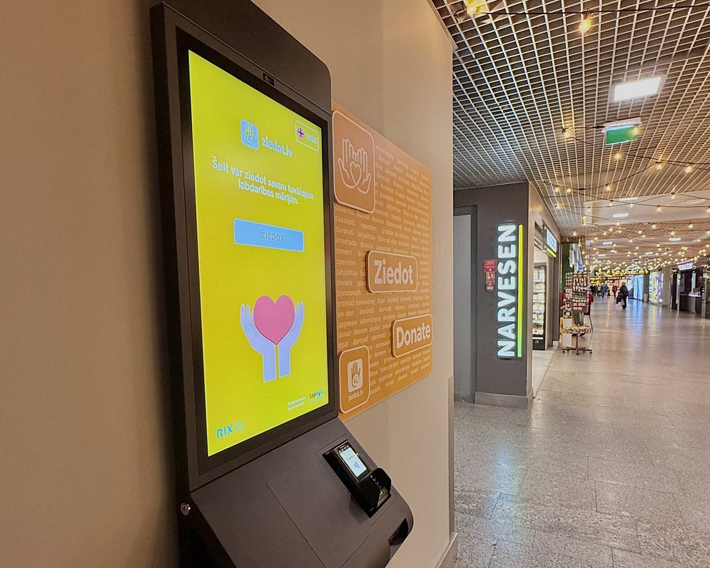 Digital charity donation box at Rīga Airport