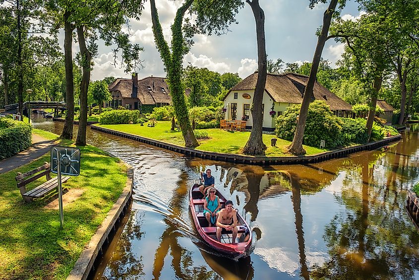 A sightseeing boat in Giethoorn, Netherlands. 