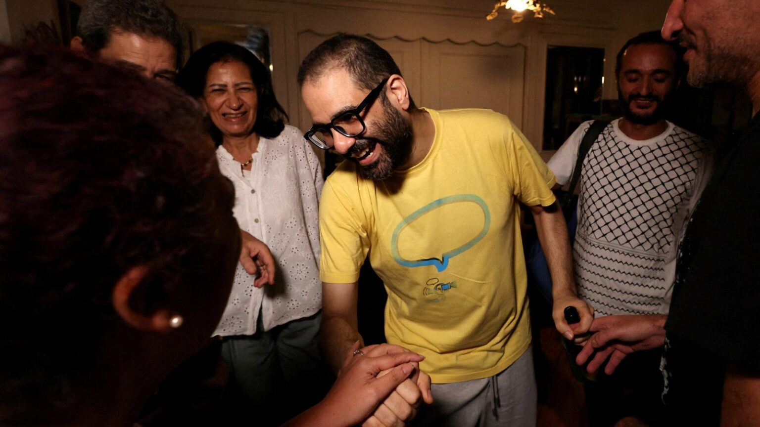 Alaa Abd El-Fattah with his family in Egypt after his prison release in September. Pic: Reuters