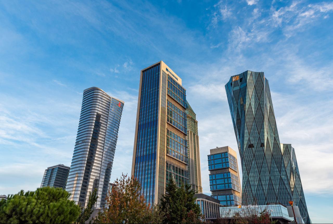 A view of the headquarters of major Turkish state-owned banks—Halkbank, VakifBank, and Ziraat Bank—at the Istanbul Financial Center (IFC) in Atasehir, Istanbul, Türkiye, December 2, 2023. (Adobe Stock Photo)