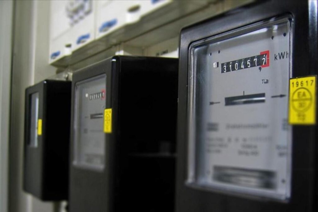 An analog electricity meter installed in a residential building in Türkiye. (AA Photo)
