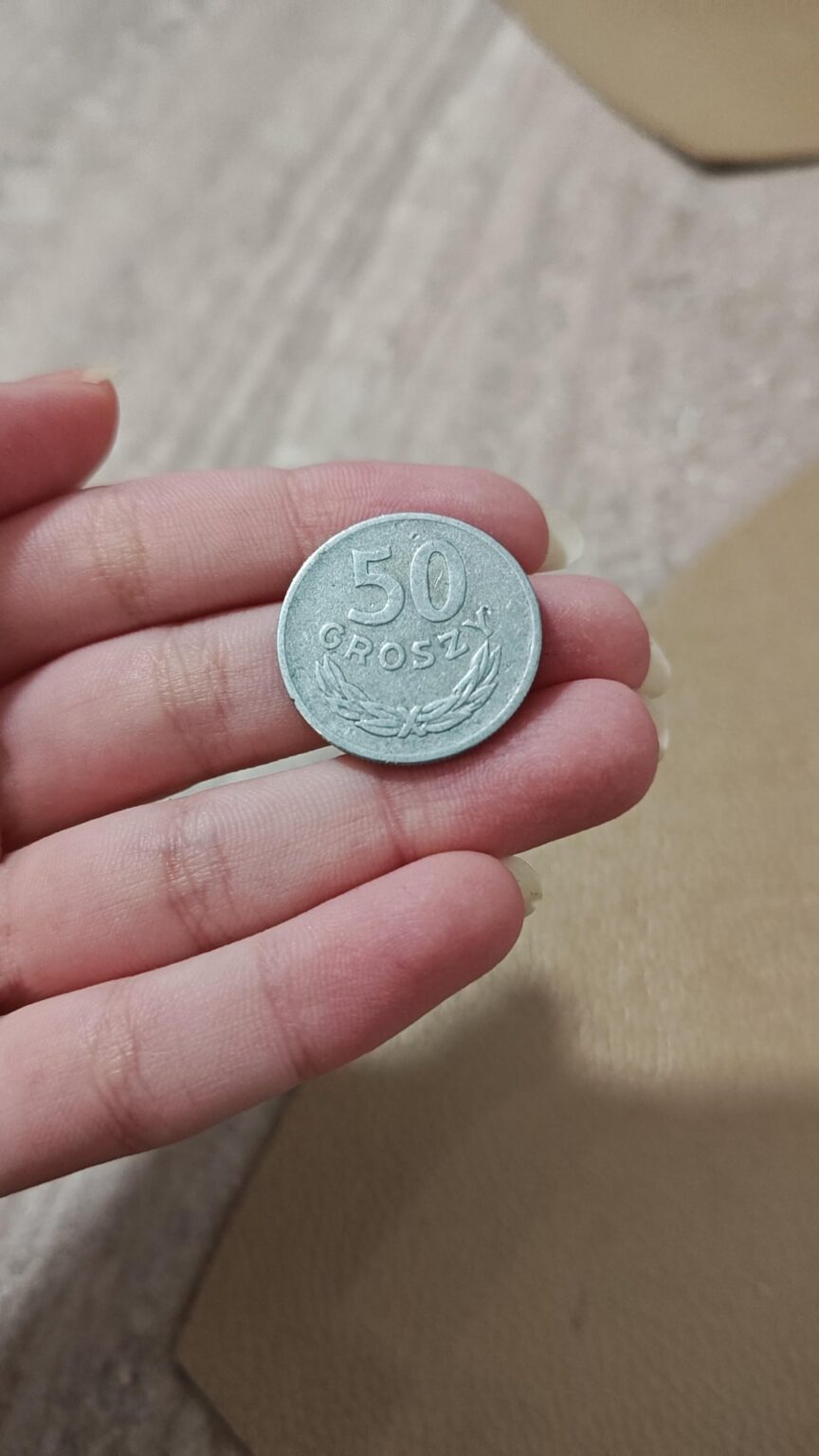 A 50 groszy coin from 1949, no visible mint mark. Is it worth anything? A 50 groszy coin from 1949, no visible mint mark. Is it worth anything?