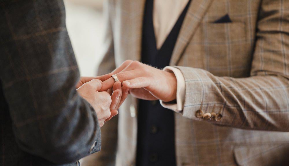 The high school did not choose the choir director because he was married to a man