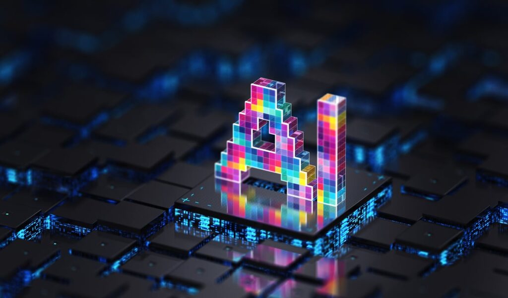 The letters A and I built out of colorful 3D pixels standing on top of a server rack.