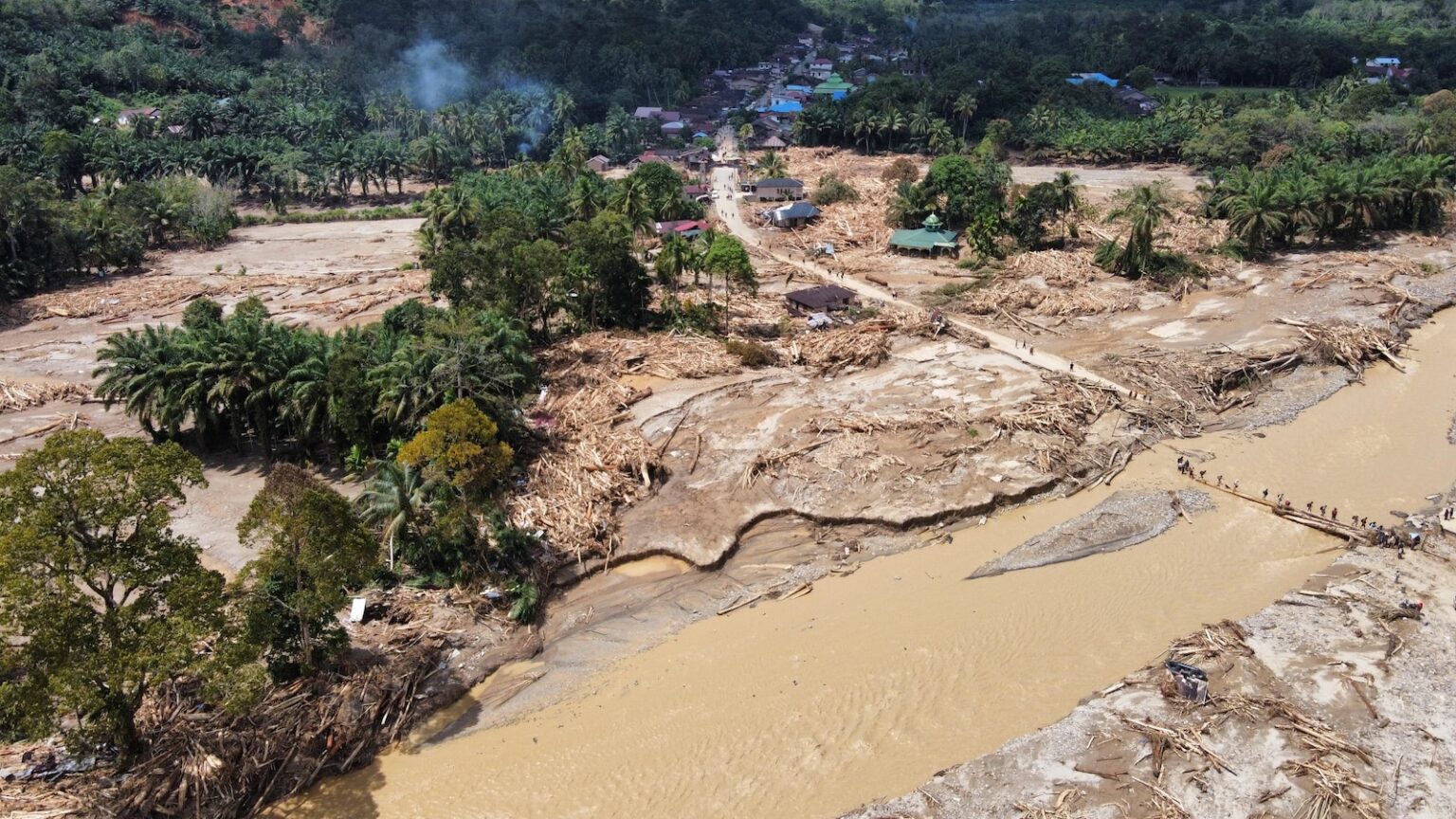 Deadly Asian floods are no fluke. They’re a climate warning, scientists say