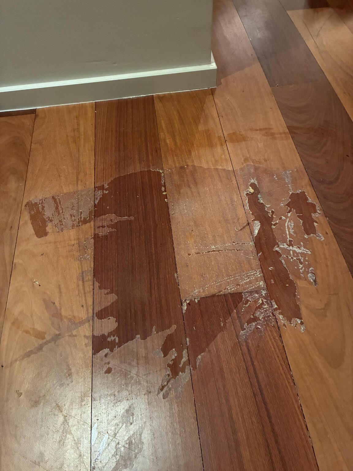 Ruined the floor by spraying perfume - what now?