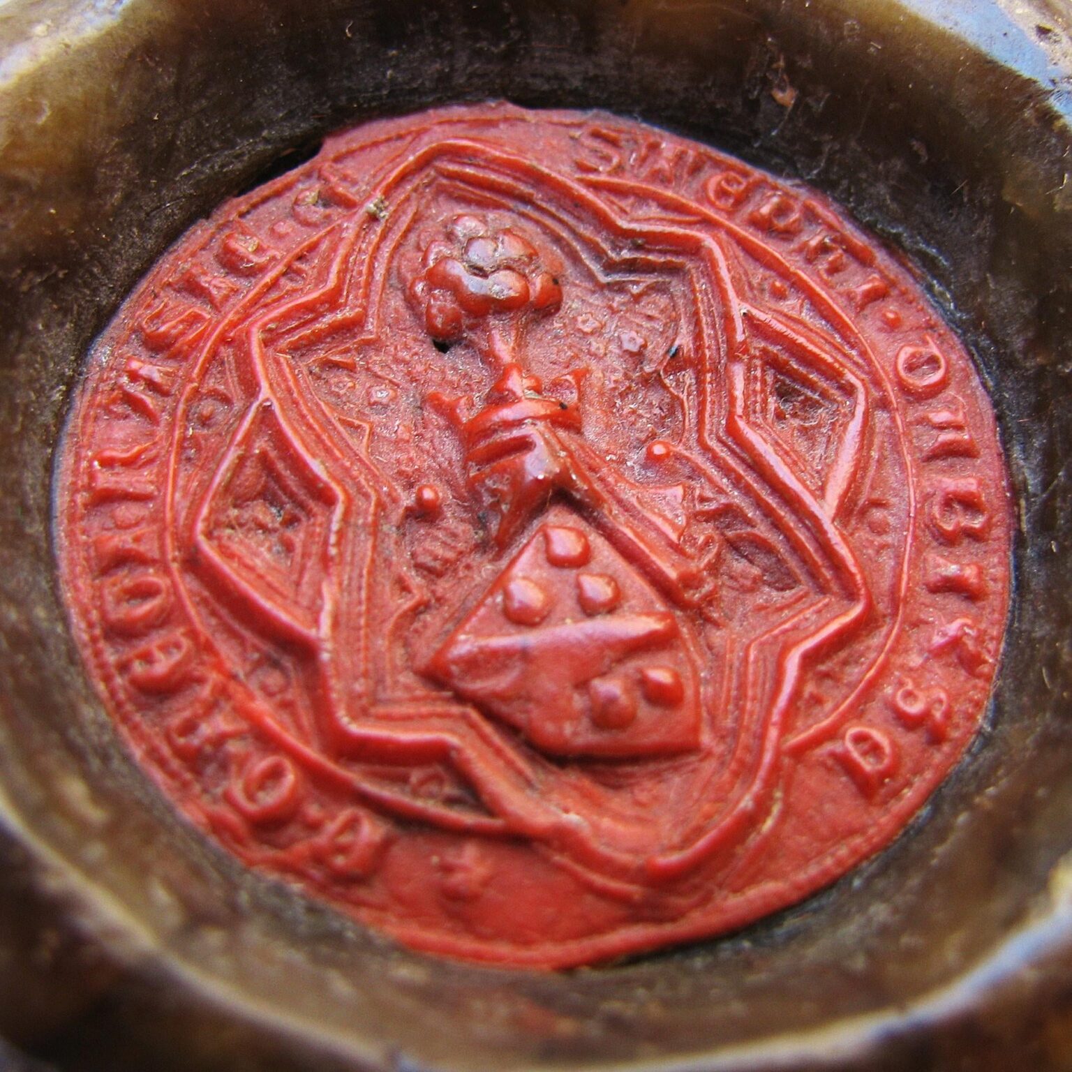 The middle hanging seal of King Tvrtko, which was also used by King Dabiš with the change of name on the legend