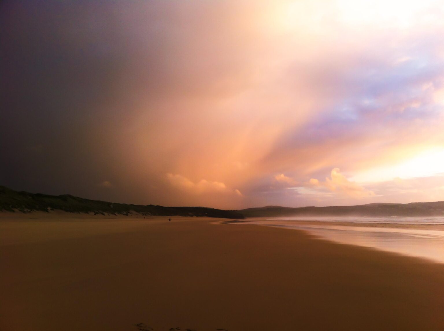 A walk along the beach at dusk.
