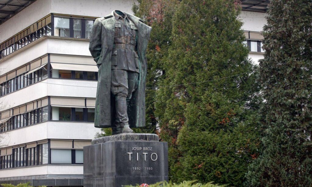 He took the head off the monument to Tito and put it in the car, the police caught him. It had Croatian plates