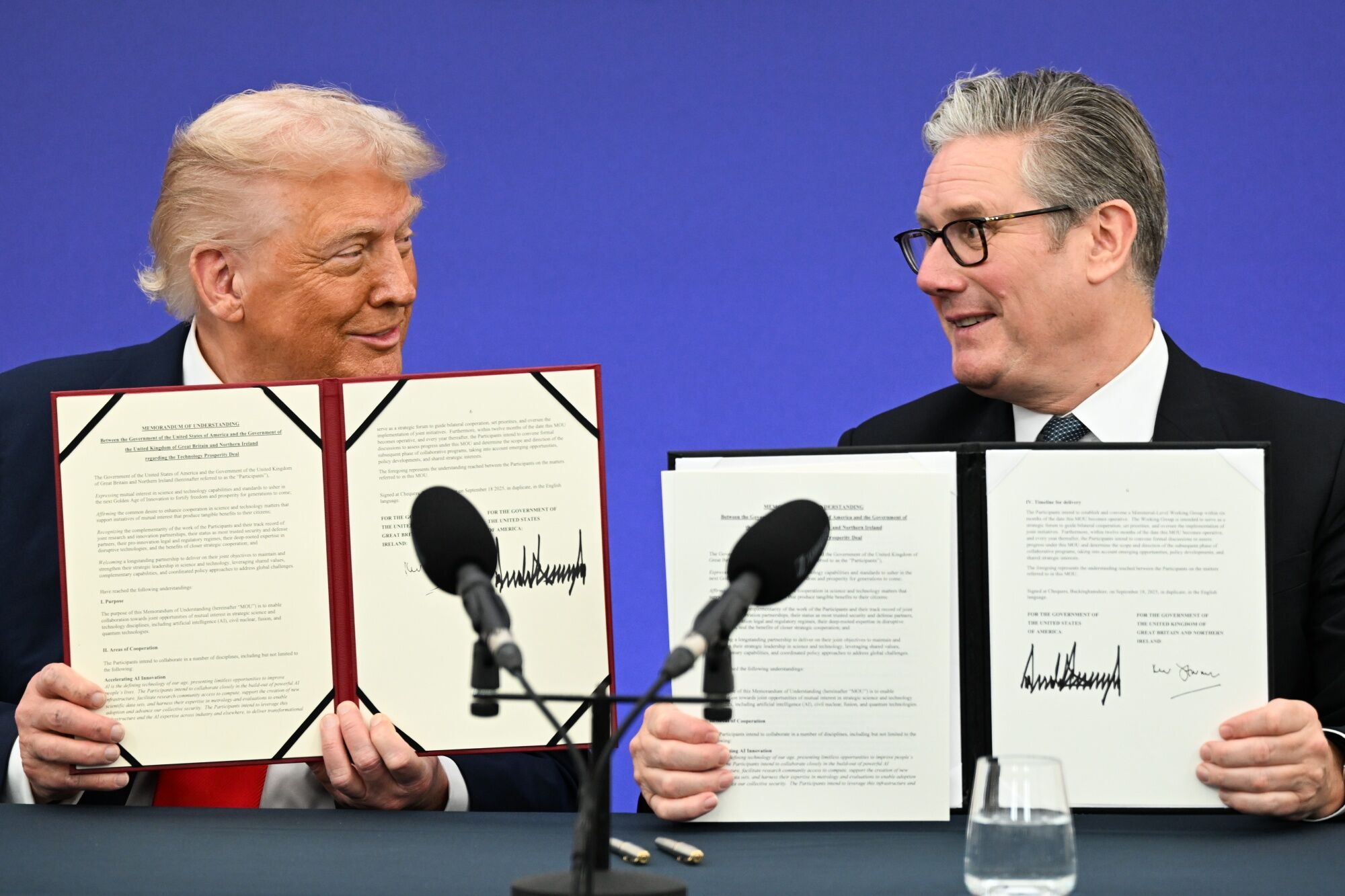 US President Donald Trump and British Prime Minister Keir Starmer signing the Tech Prosperity Deal.