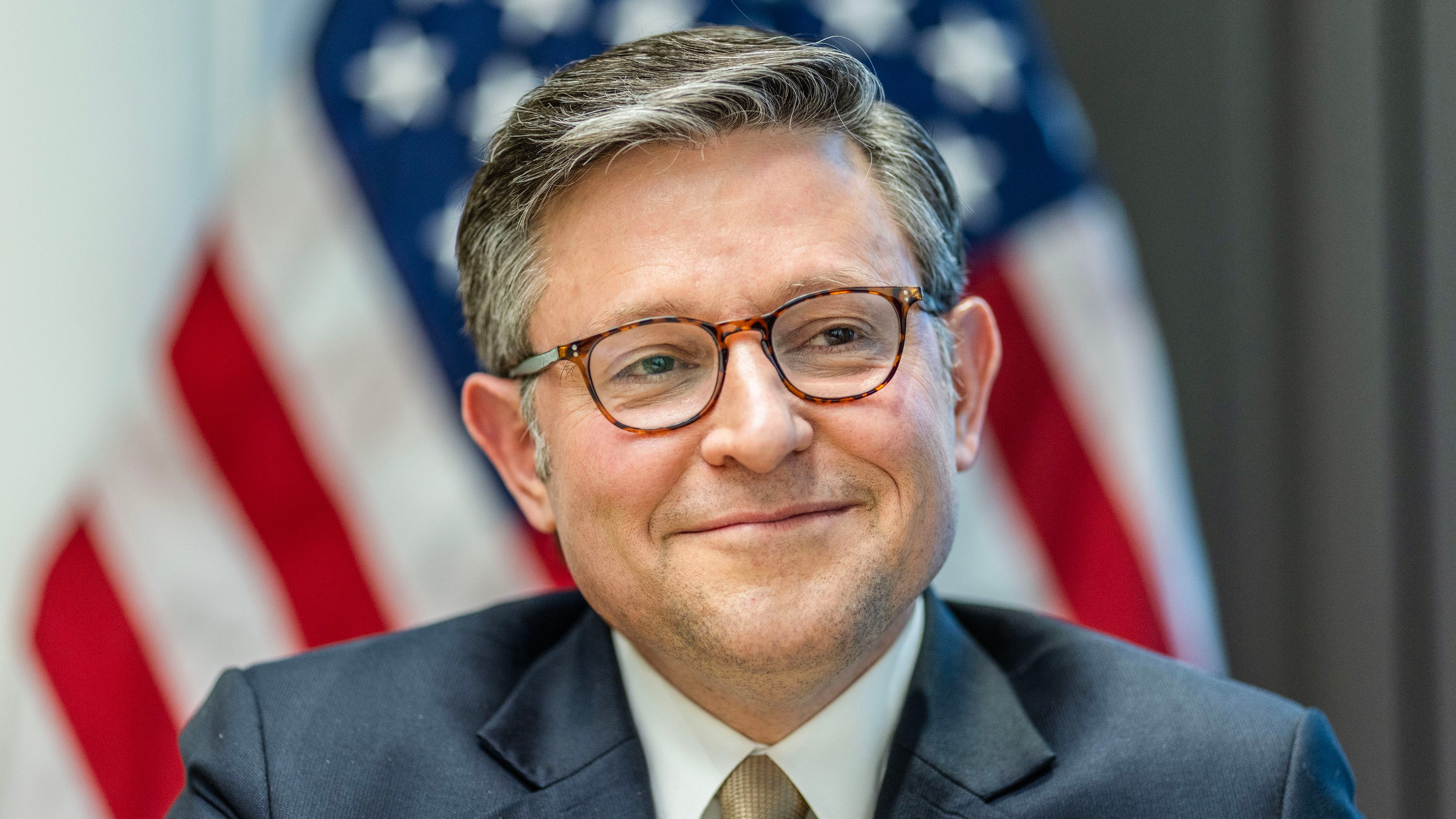 James Michael Johnson, Speaker of the United States House of Representatives, smiling at the US Embassy in London.