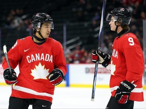 Zayne Parekh of Canada celebrates his power-play goal