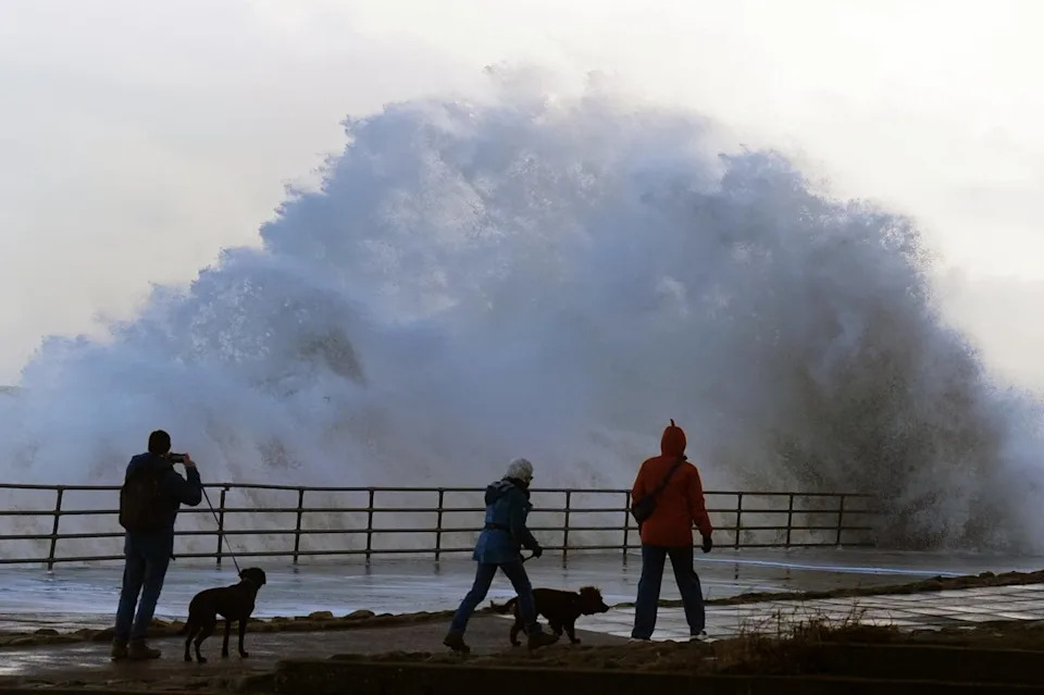 Waves crash against the sea wall in Whitley Bay, North Tyneside (Owen Humphreys/PA Wire) (PA)