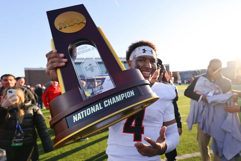 Chambliss celebrates after leading Ferris State to the D-II national championship last December. (C. Morgan Engel/NCAA Photos via Getty Images)