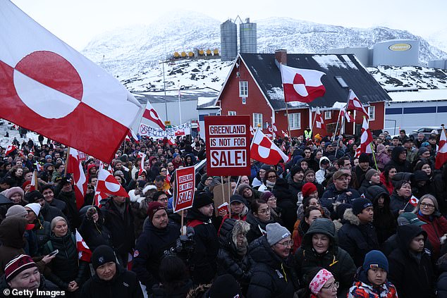 On Saturday, hundreds of people in Greenland's capital braved near-freezing temperatures to march in a rally in support of their own self-governance