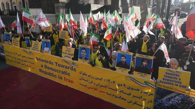 Activists from the Association of Anglo-Iranian Women in the UK during a rally outside 10 Downing Street, Whitehall, central London, to show solidarity with the protests in Iran over the country's ailing economy. Picture date: Saturday January 3, 2026.