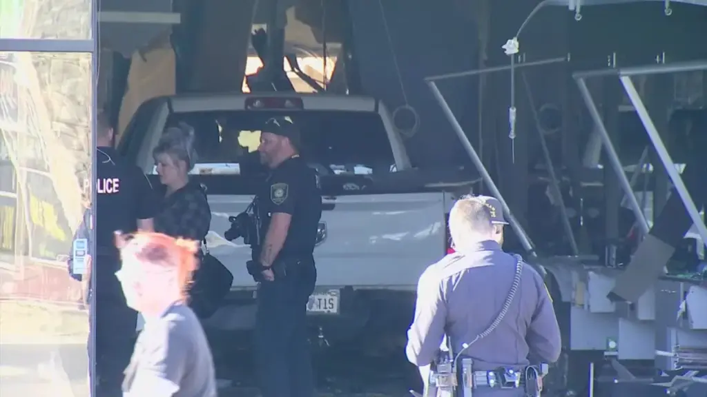 Norman stylist recovering after car crashes into business