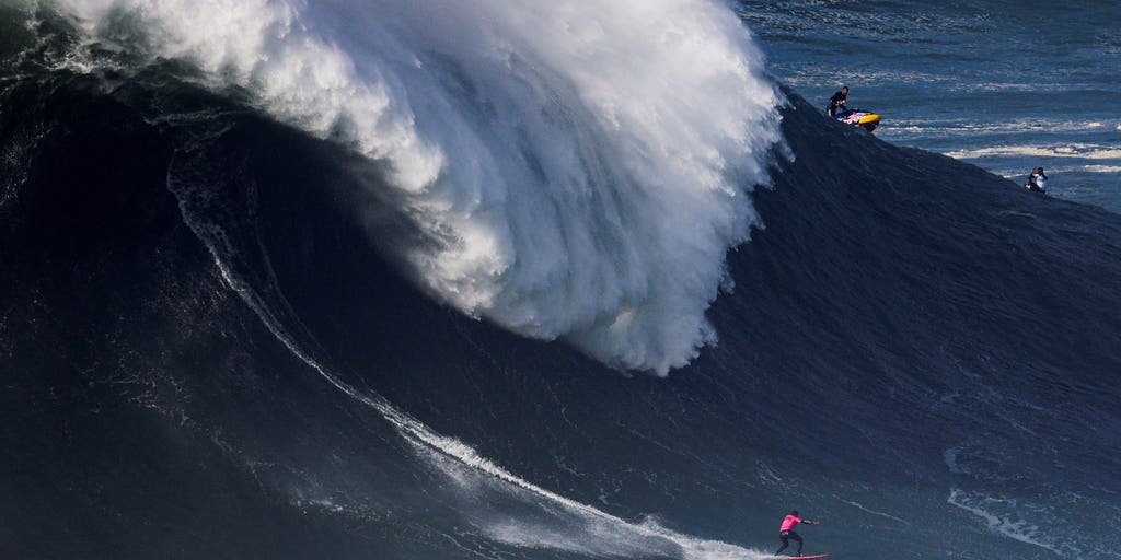 Nazaré: How the biggest waves in the world break off the coast of Portugal