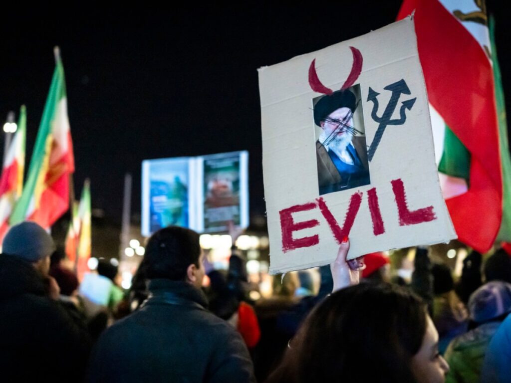 Iran protests in Switzerland: Tense scenes at Bern embassy as police use tear gas