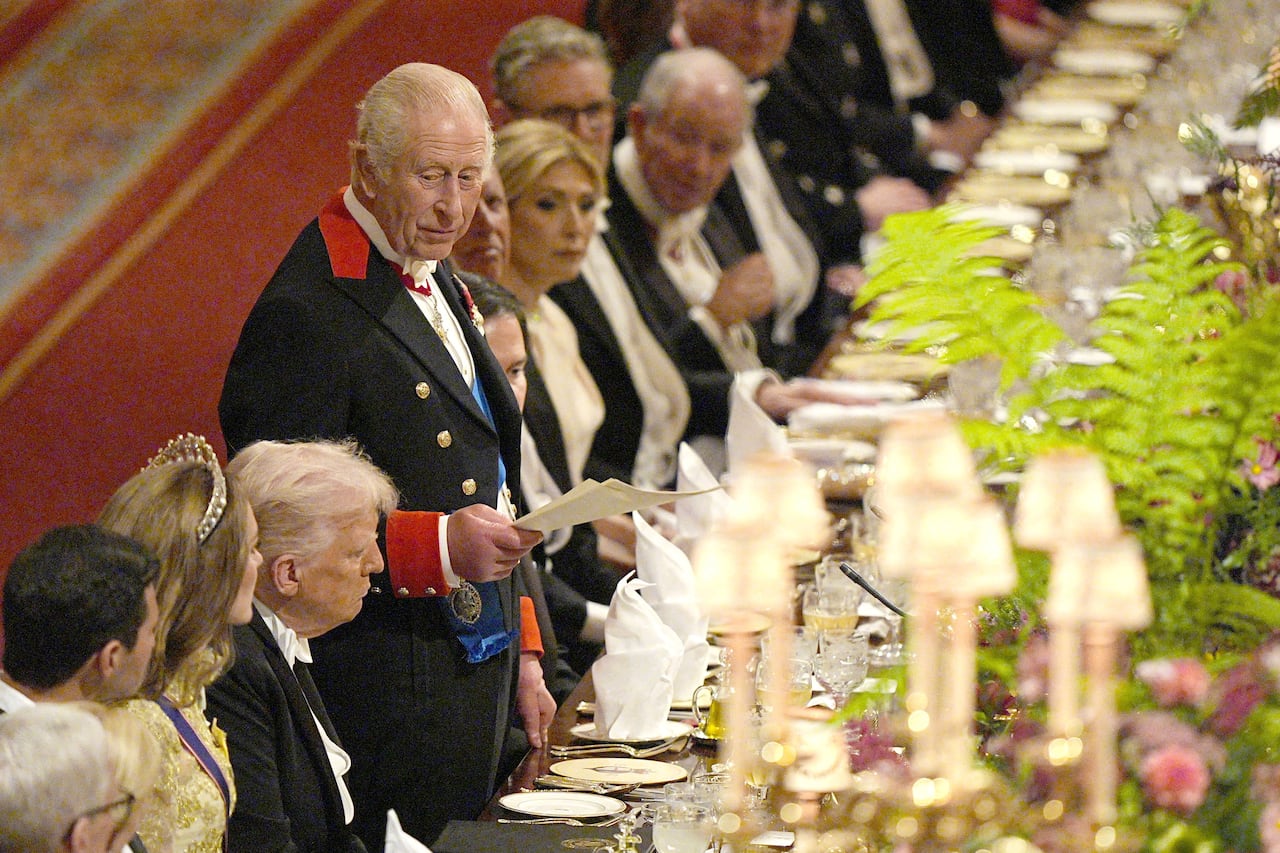 U.S. President Donald Trump listens as Britain's King Charles speaks during the state banquet at Windsor Castle, Berkshire, on day one of US President Donald Trump and First Lady Melania Trump's second state visit to the UK, Wednesday September 17, 2