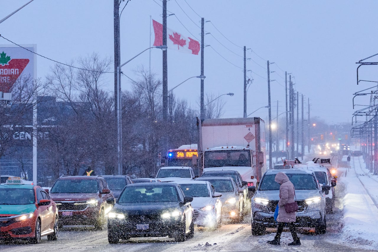 Commuters cope with another day of heavy snowfall, in Scarborough, on Jan. 16, 2026.
