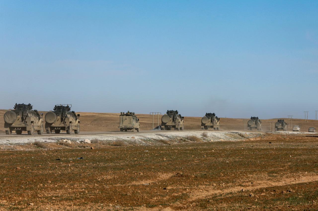 Syrian government forces make their way to the city of Hasakah in northeastern Syria on January 20, 2026. (AFP Photo)