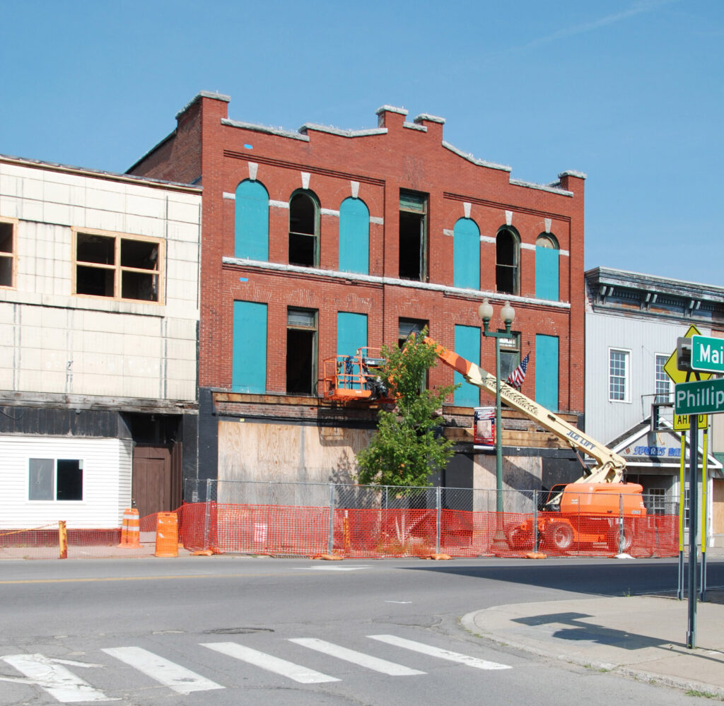 Construction to begin on Massena School of Business The former Massena School of Business building suffered a major collapse on July 13, prompting the village to close Main Street between Phillips Street and Water Street until further notice. (NCN photo by Debbie Morgan)