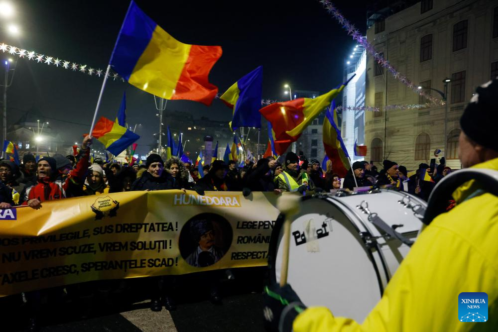 People take part in anti-austerity rally in downtown Bucharest, Romania-Xinhua