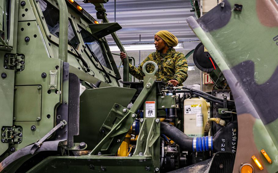 A U.S. Marine inspects a pre-positioned vehicle at a Norway cave site in January 2026 ahead of exercise Cold Response.