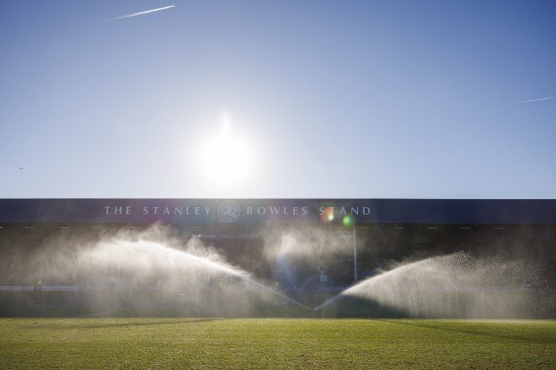 LONDON - Pregame sprinklers water the pitch at MATRADE Loftus Road Stadium in London, England shortly before a match between Queens Park Rangers and Sheffield Wednesday on Sunday, Jan. 4, 2026. Austin DeSisto/Capital News Service