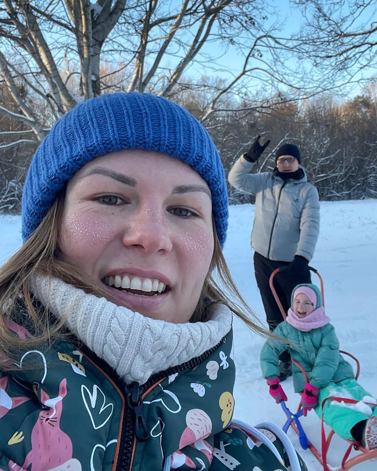 Kateryna Matiukhina with her husband, Heorhii, and their 7-year-old daughter, Ivanna.