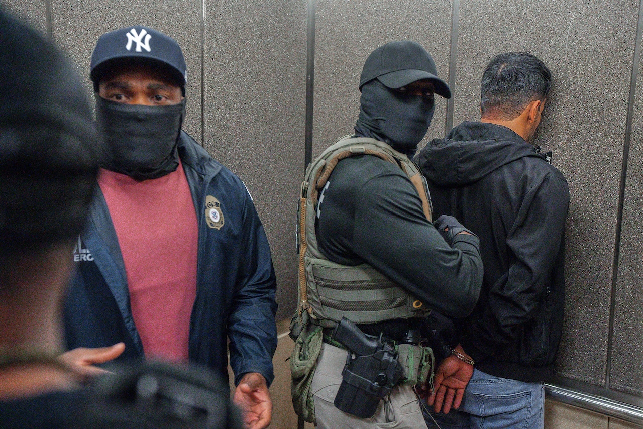 Immigration agents make an arrest in New York