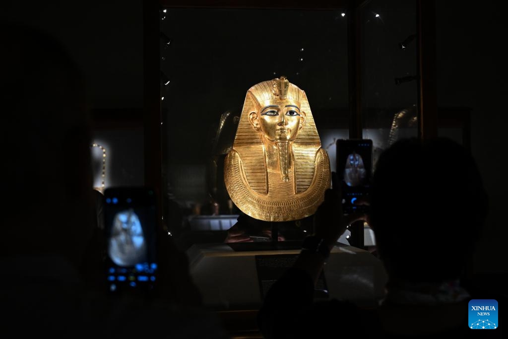 This photo taken on Dec. 9, 2025 shows people taking photos of an exhibit at the Egyptian Museum in Cairo, Egypt. (Photo: Xinhua)