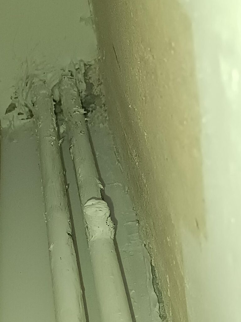 Sealing pipes in a large slab