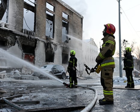 Firefighters extinguish a fire in destroyed building after Russian drone attack in Kyiv, Ukraine.