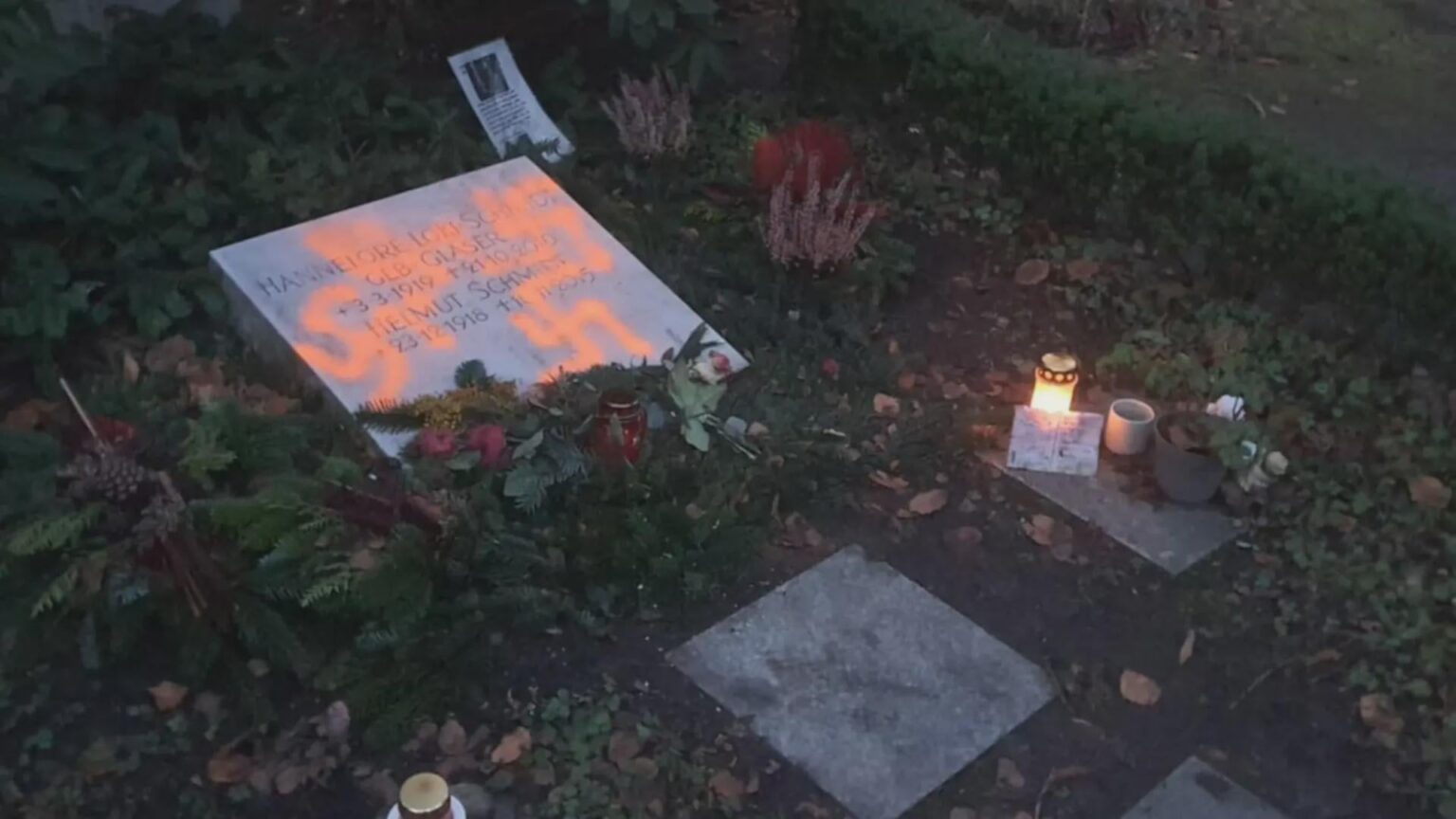 Unknown people smear Helmut and Loki Schmidt's grave with swastikas
