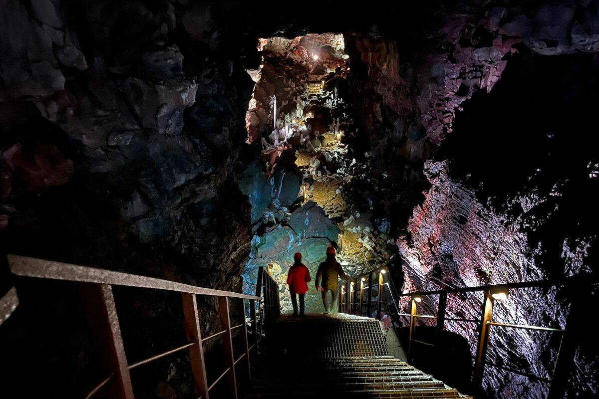 Exploring the Raufarholshellir lava tunnel. (Tess van Straaten)