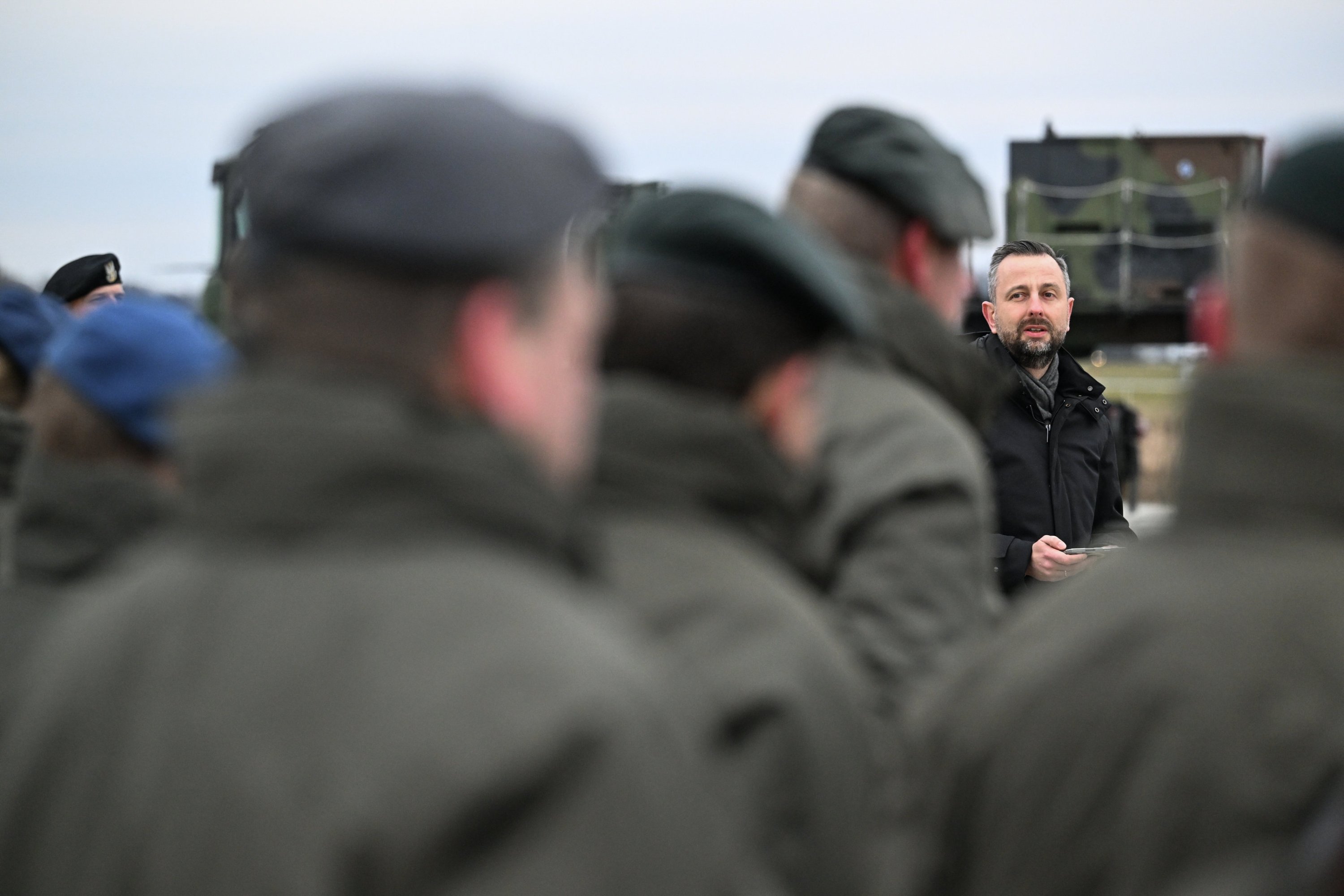 Polish Deputy Prime Minister and Minister of National Defense Wladyslaw Kosiniak-Kamysz (C) visits Dutch military forces stationed at the airport Rzeszow-Jasionka, Poland, Dec. 24, 2025. (EPA Photo)