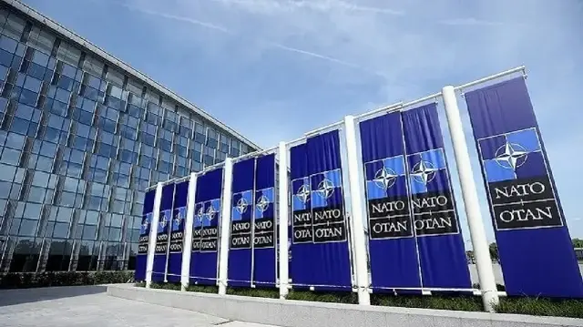 NATO official says alliance nearing compromise on Greenland flag