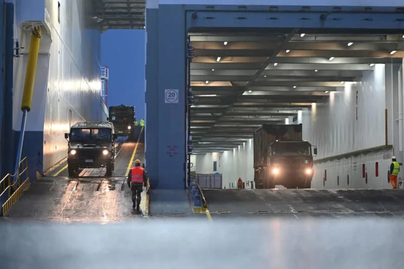 Italian soldiers arrive with equipment and vehicles as The North Atlantic Treaty Organization (NATO) launches "Steadfast Dart," its largest multinational exercise of the year. Lars Penning/dpa