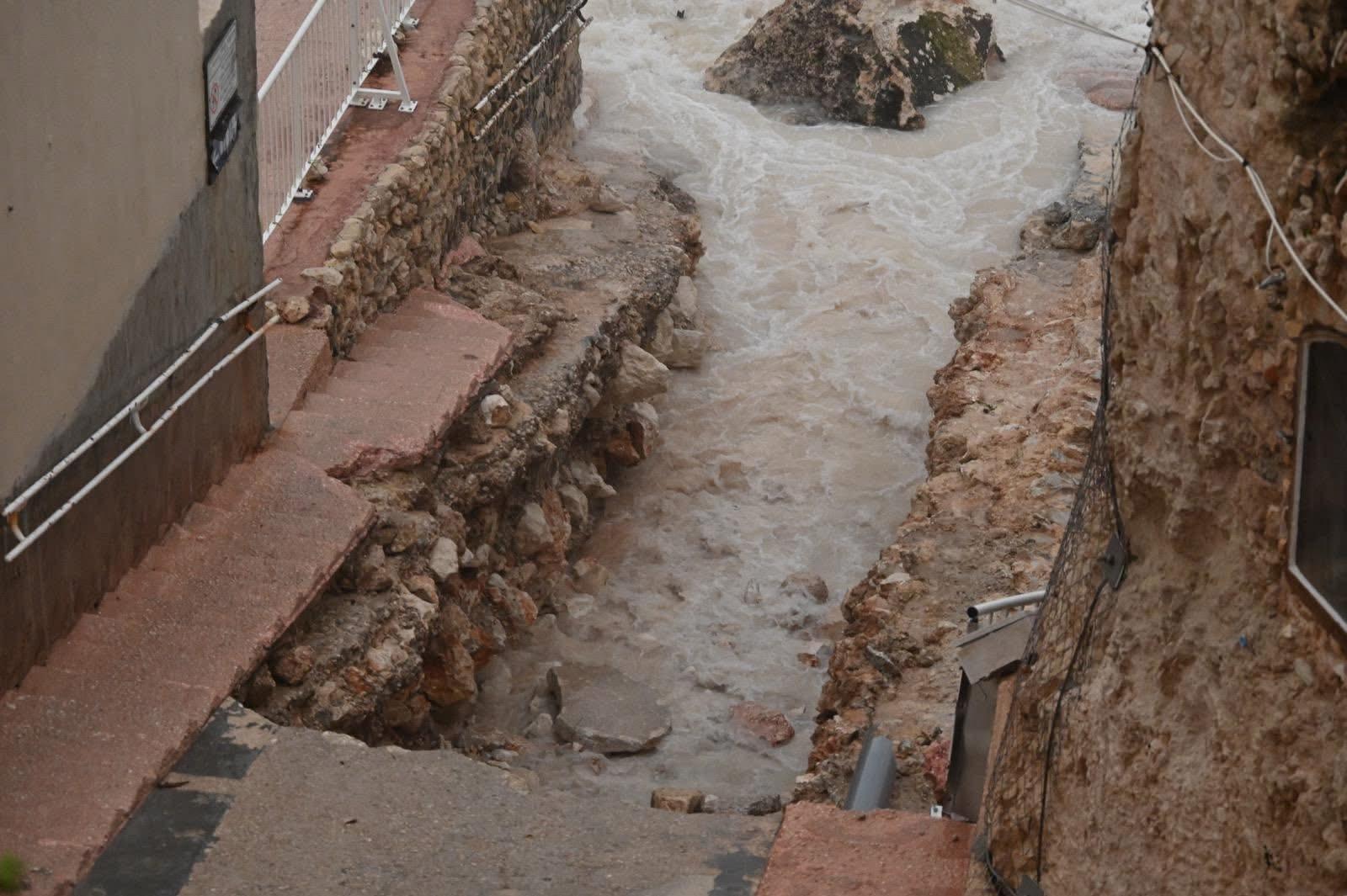The lower part of the access road to the beach at Għar Lapsi was carried away by the waves. Photo Siġġiewi Council/Facebook.