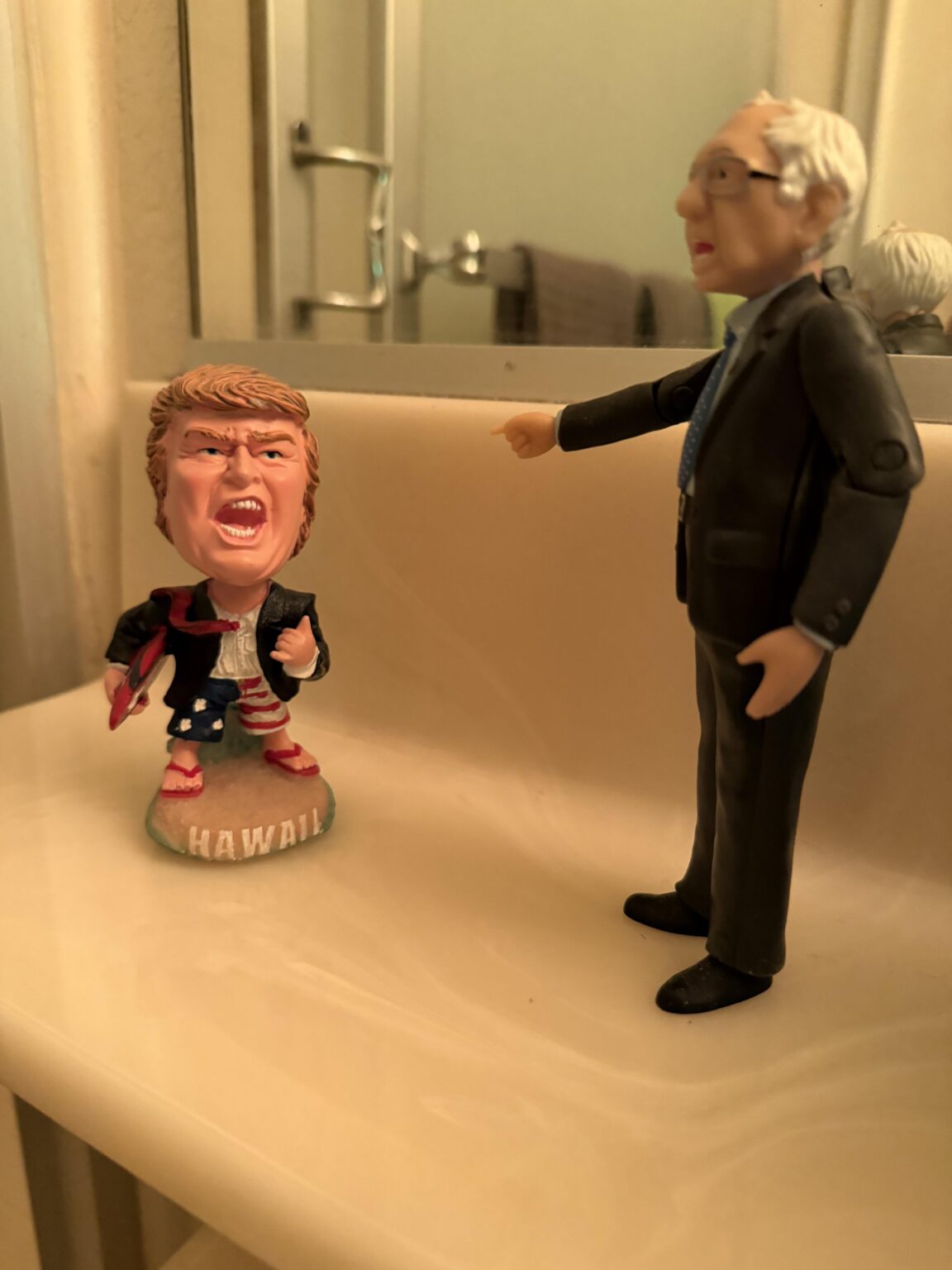 My in-laws are on opposite ends of politics. This is in their bathroom.